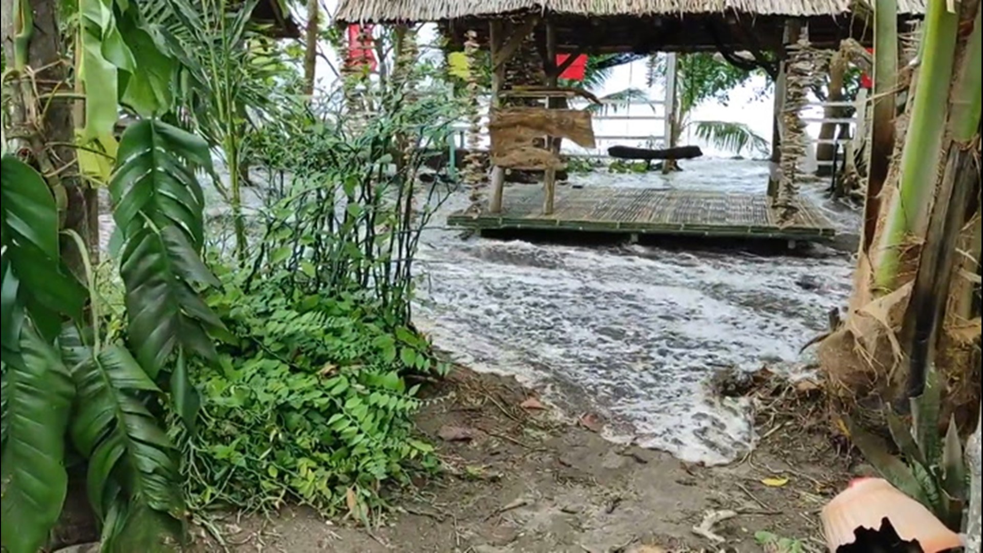 As Tropical Storm Dujuan struck the Philippines, tidal surge swept through a resort along the coast in Cateel on Feb. 21.