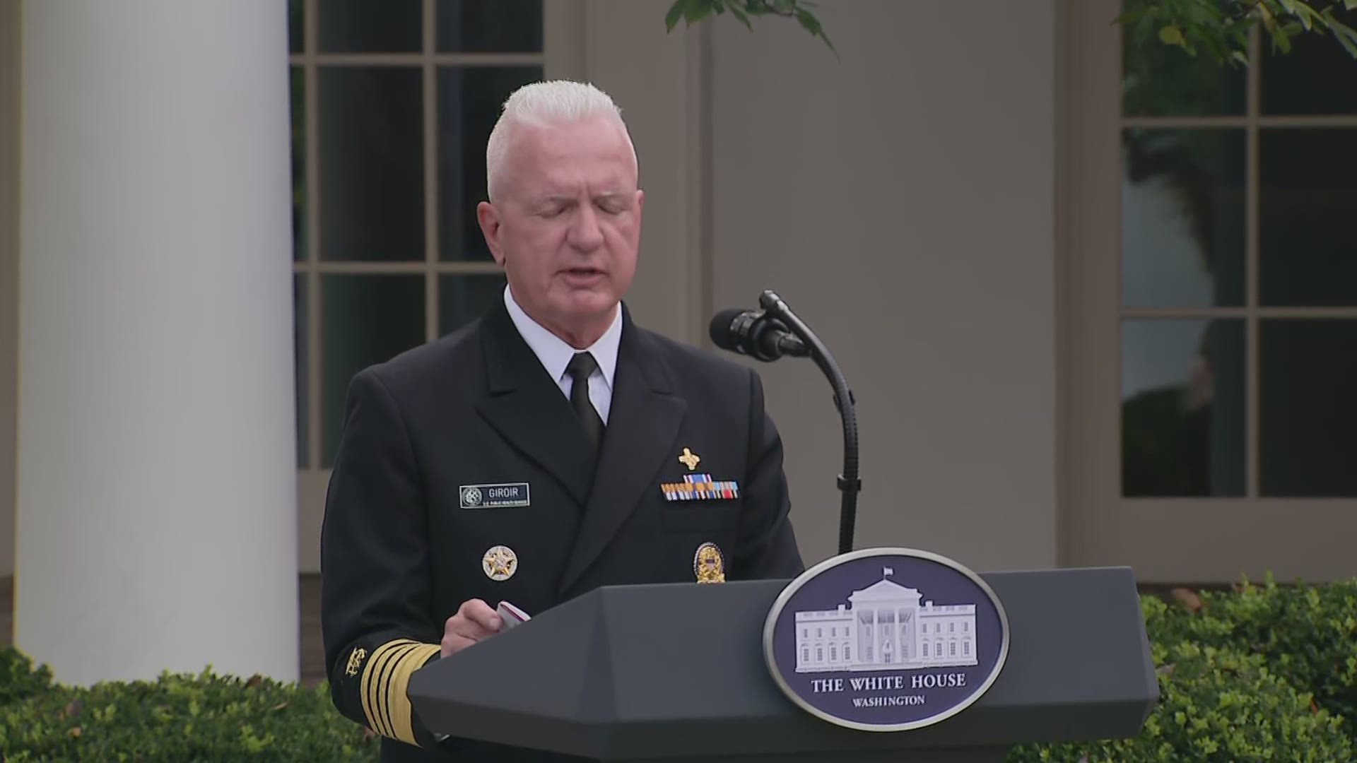 Admiral Brett Giroir displayed at a Monday White House briefing how a rapid Abbott test being sent out to schools will perform.