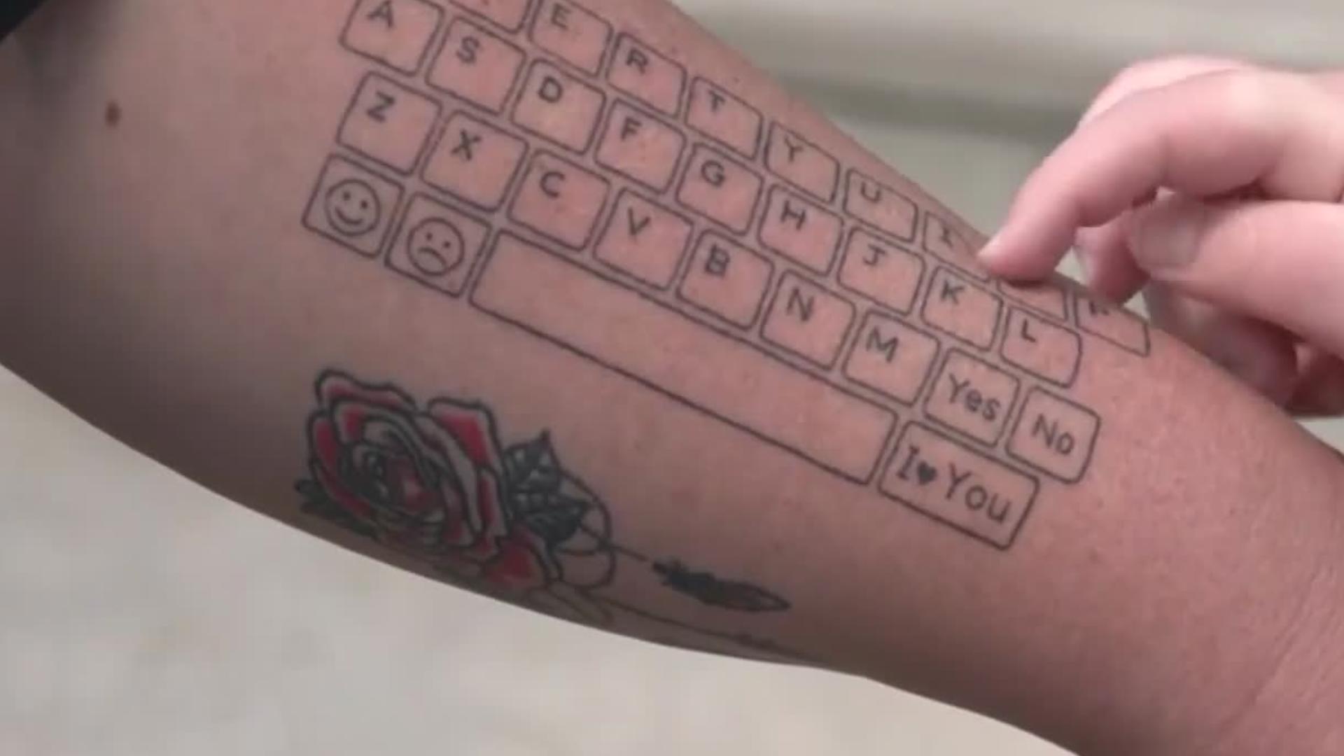 Mother's keyboard tattoo helps nonverbal son communicate