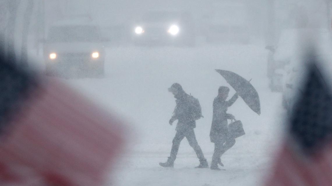 How is a blizzard different from a winter storm?