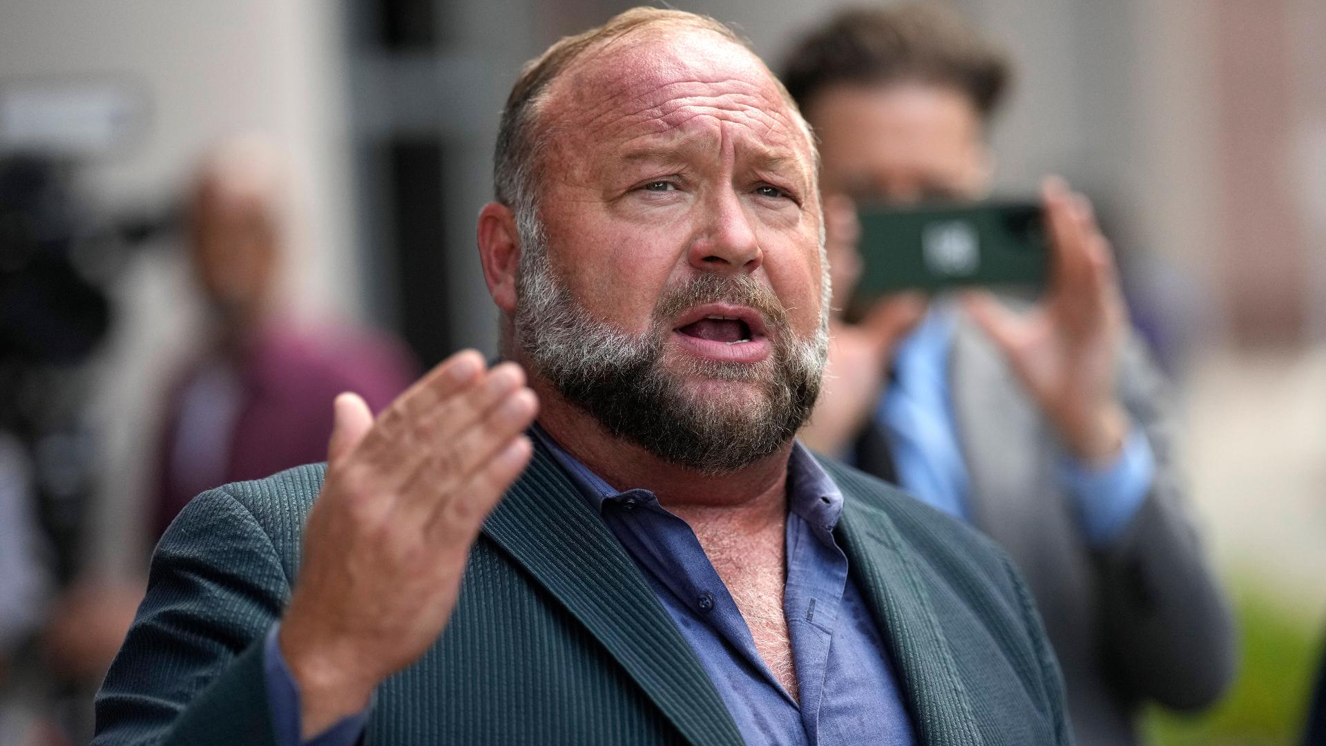 Court cuts $50M judgment against Alex Jones over falsely labeling Sandy Hook killings a hoax