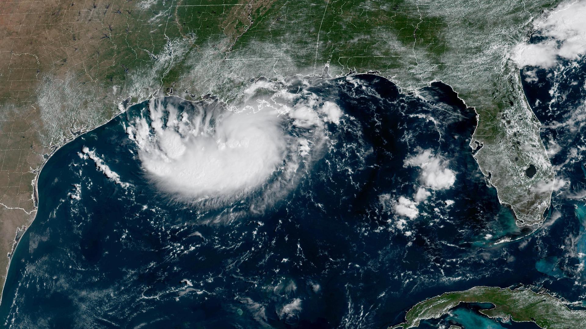 Texas and Louisiana warned of tropical storm, while another storm moves toward Hawaii