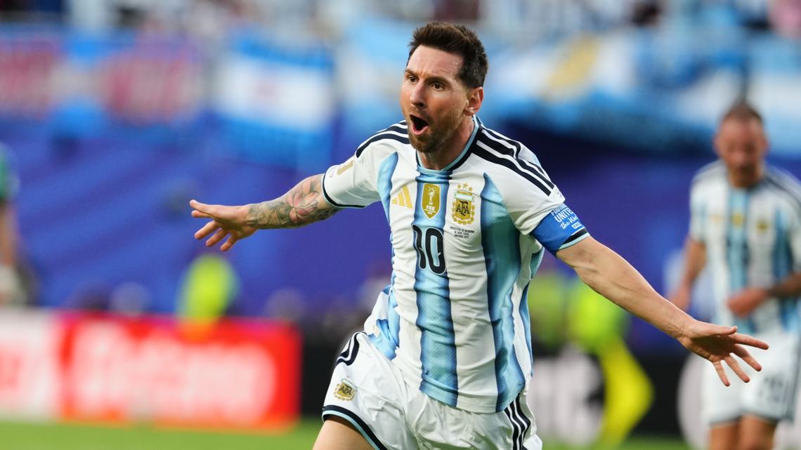 What records did Lionel Messi break in Argentina's World Cup opener?