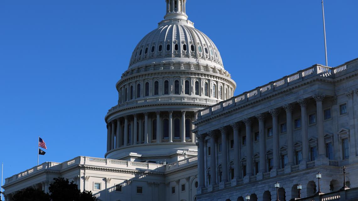 What services would a partial government shutdown affect if a funding deal isn't reached?