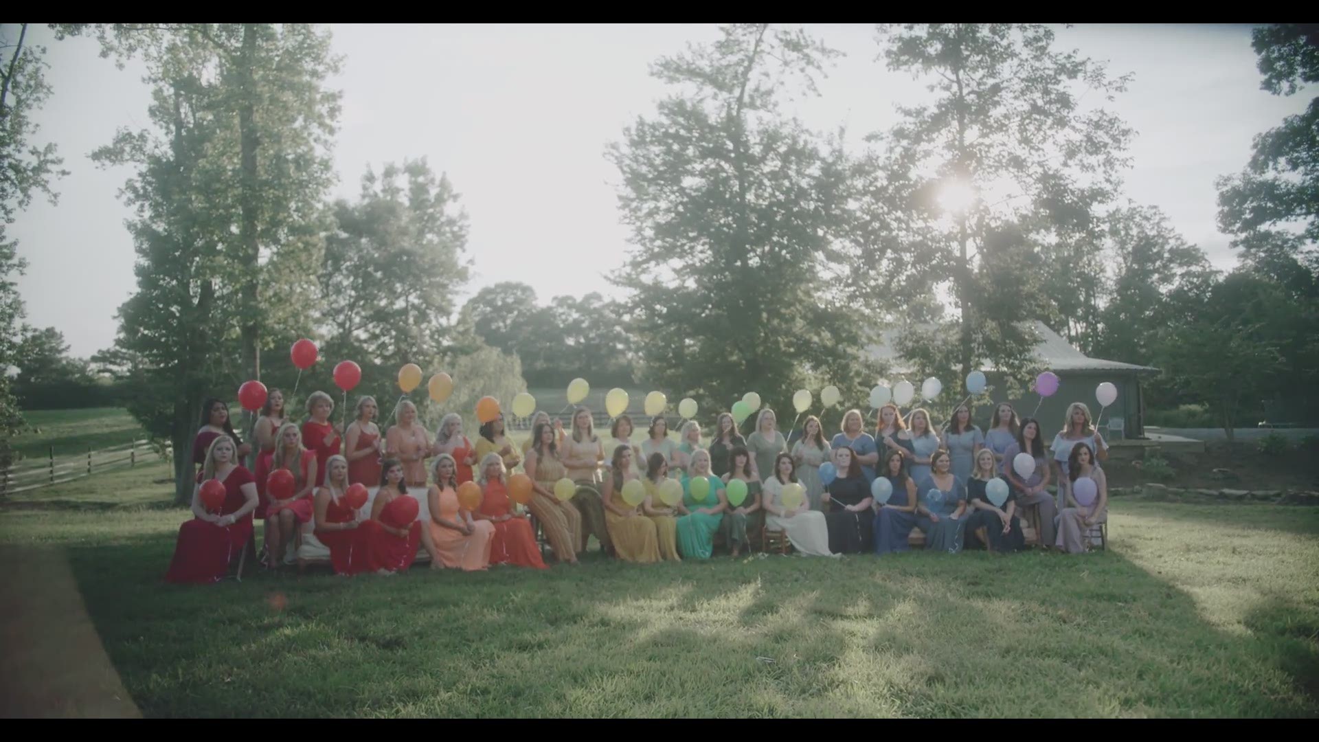 This photographer brought together 79 mothers and 'rainbow babies' for an inspiring photoshoot.