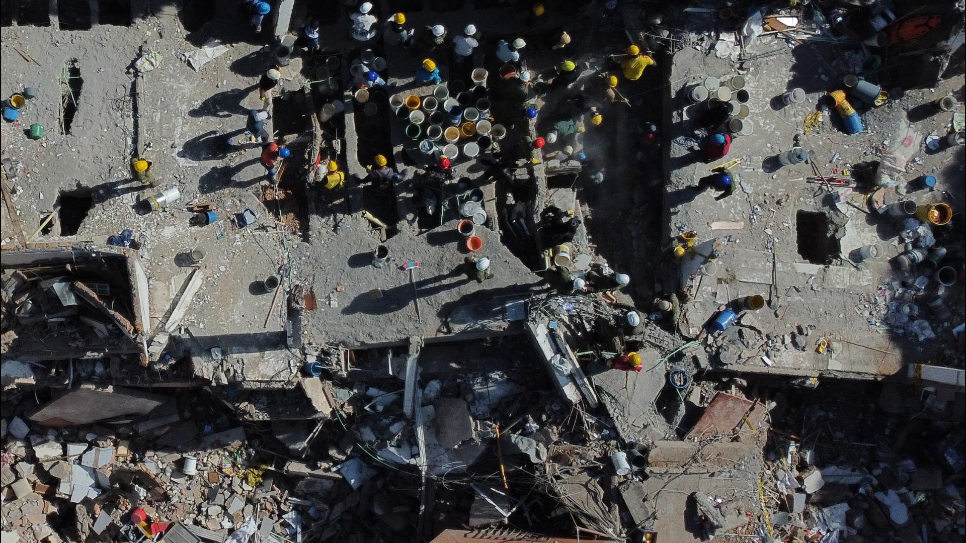 Earthquake response strains Colombia's new government and rescuers as time runs down for survivors