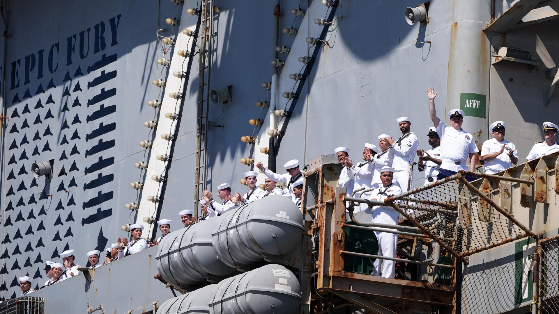 USS Lincoln sailors meet their babies for the first time after returning to San Diego