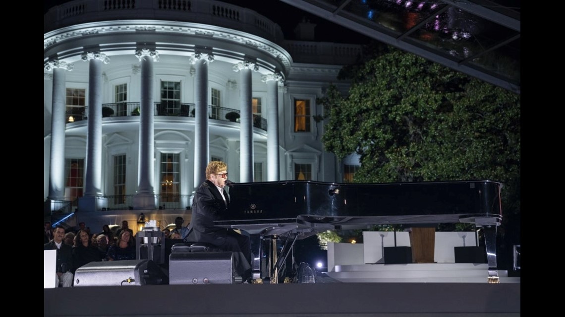 Elton John and Harry Styles Pay Tribute to Queen Elizabeth During Concerts