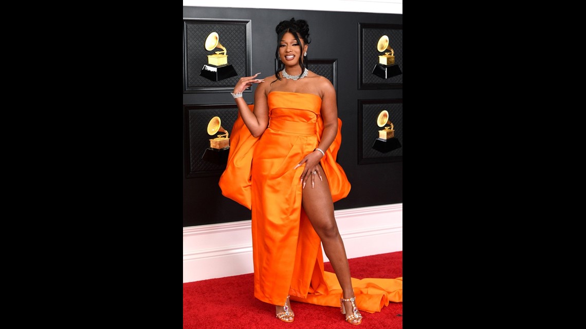 orange dress grammys Megan Thee Stallion Stuns in Chopard Jewels and a Dolce & Gabbana Gown on  Grammys Red Carpet
