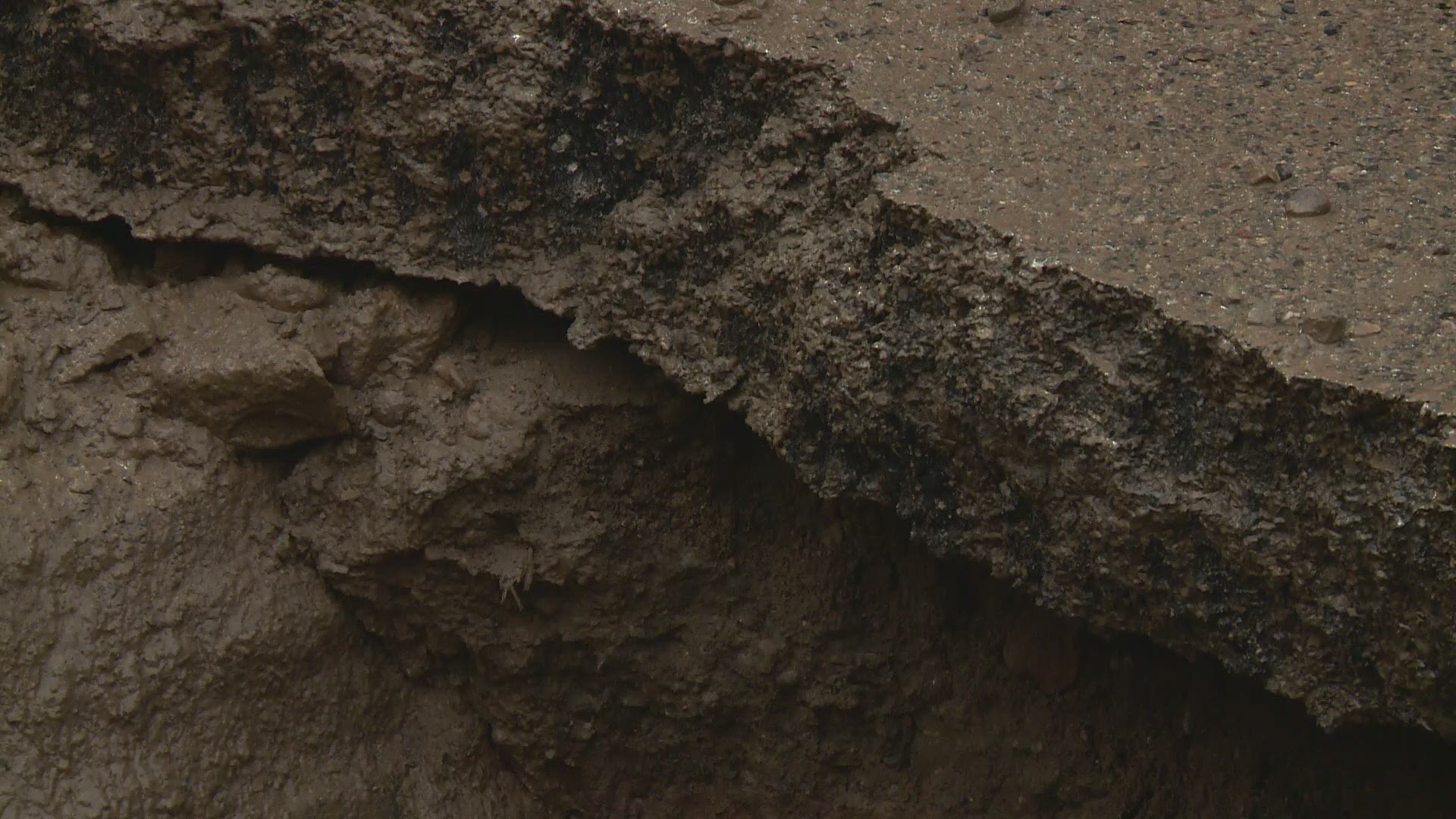 Crews are scrambling to repair a huge sinkhole that has developed under Kellogg Avenue in St. Paul.