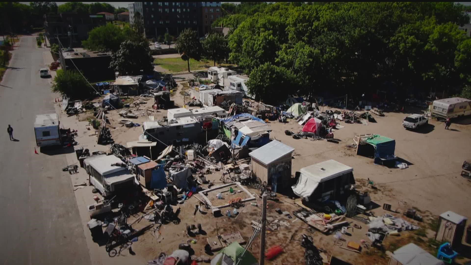 A Minneapolis husband-wife property management team was forced to investigate the theft of their property themselves as police deemed the encampment "too hostile."