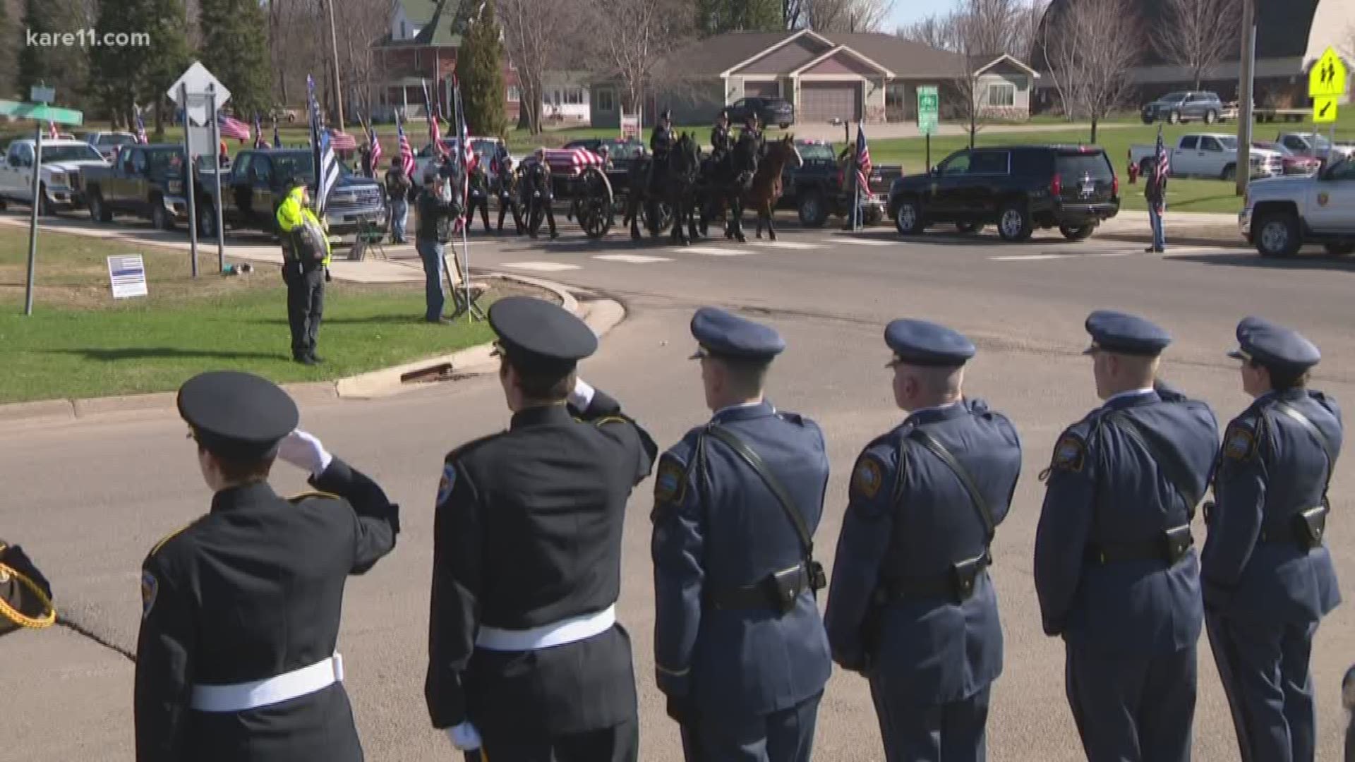 Hundreds gathered outside the Pine City Civic Center to honor the life of Minnesota Department of Natural Resources Conservation Officer Eugene Wynn Friday morning. Wynn died in the line of duty last weekend.