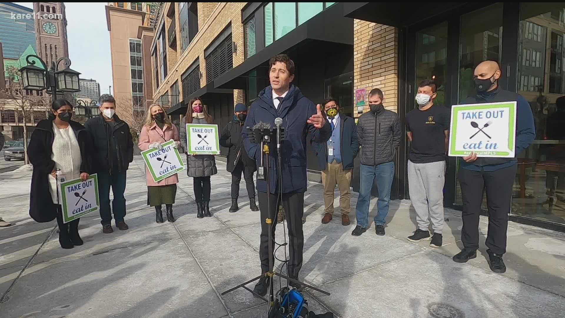 Mayor Frey and city council members gathered outside a Minneapolis restaurant to ask people to support local restaurants as they operate under a vaccine mandate.