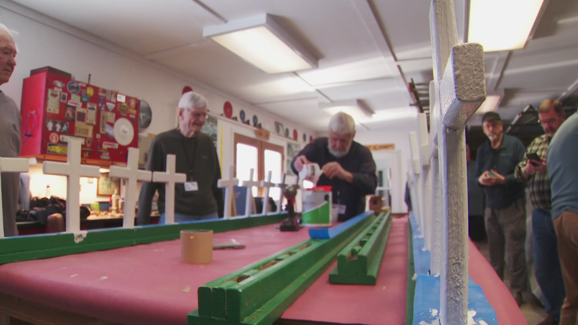 The members of Hopkins' chapter of "Men's Shed" banded together on Memorial Day to restore flags and crosses honoring fallen soldiers at the city's fire department.