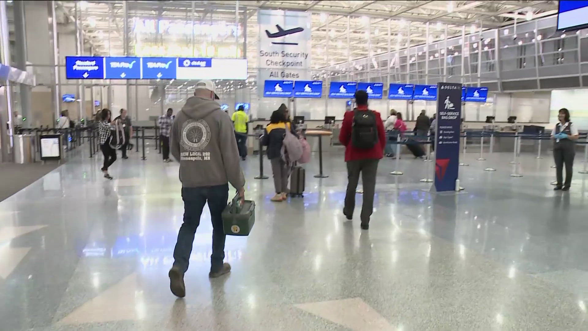 About 50,000 people are expected to pass through security checkpoints on Wednesday, as families embark on MEA getaways.