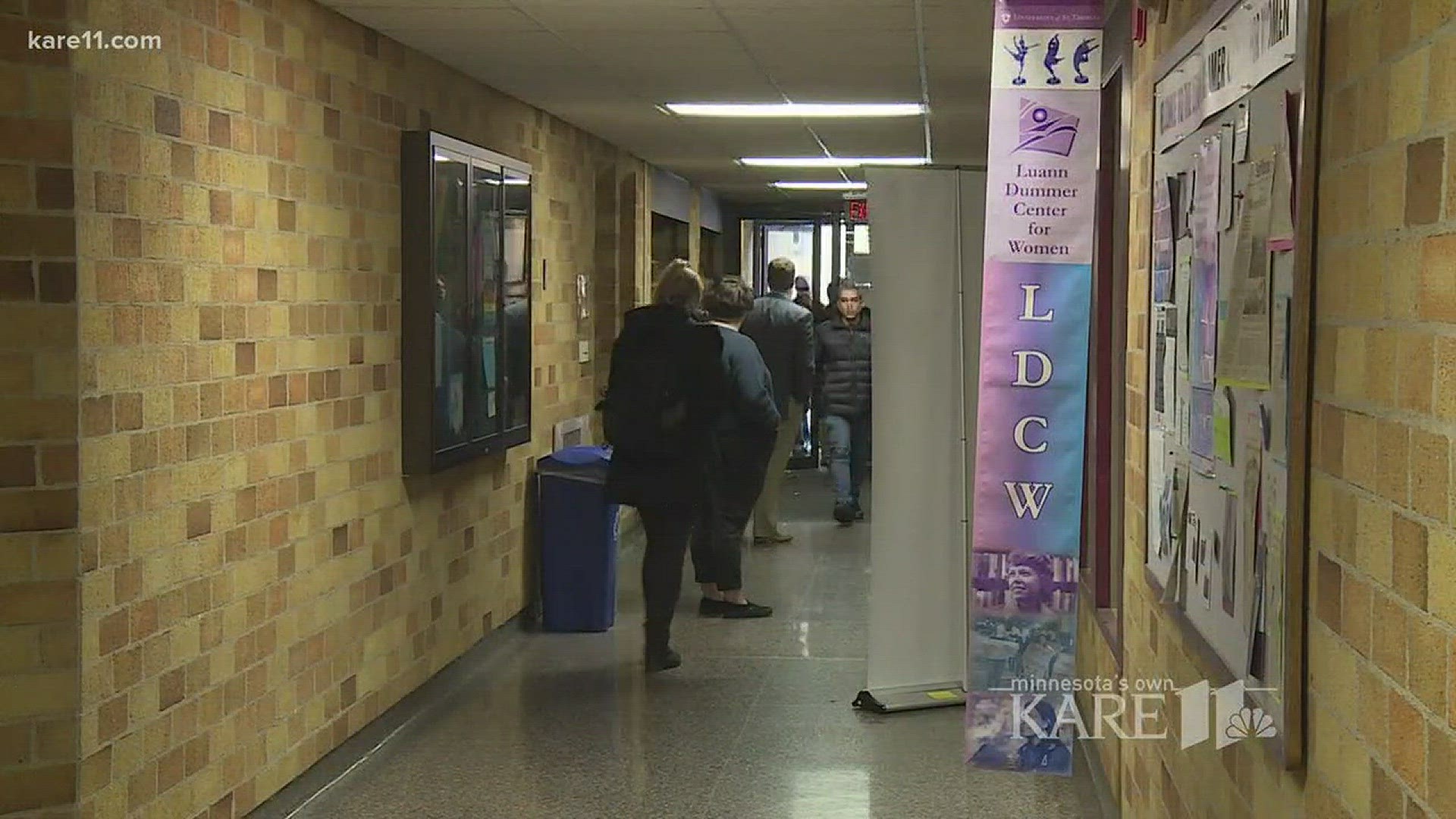 At the University of St. Thomas, flags of hope and peace hang outside. Today, however, there's one sign pointing to an auditorium where, inside, two different messages are being spoken. http://kare11.tv/2l2eIe1