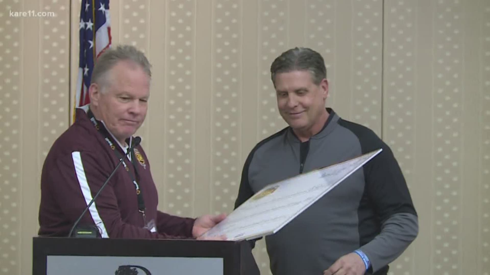 The Minnesota Football Coaches Association presented Randy's foundation with a check of how much was raised this year...more than $348,000.