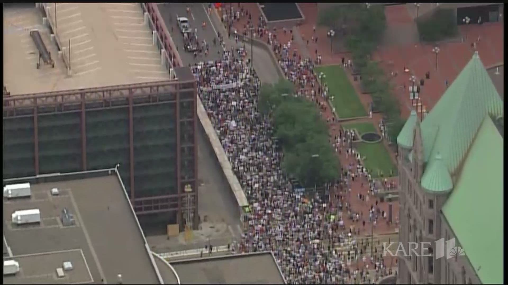Thousands of protesters gathered outside the Minneapolis Convention Center on Saturday, joining groups across the country to rally for families separated at the border. https://kare11.tv/2lHcf5Y