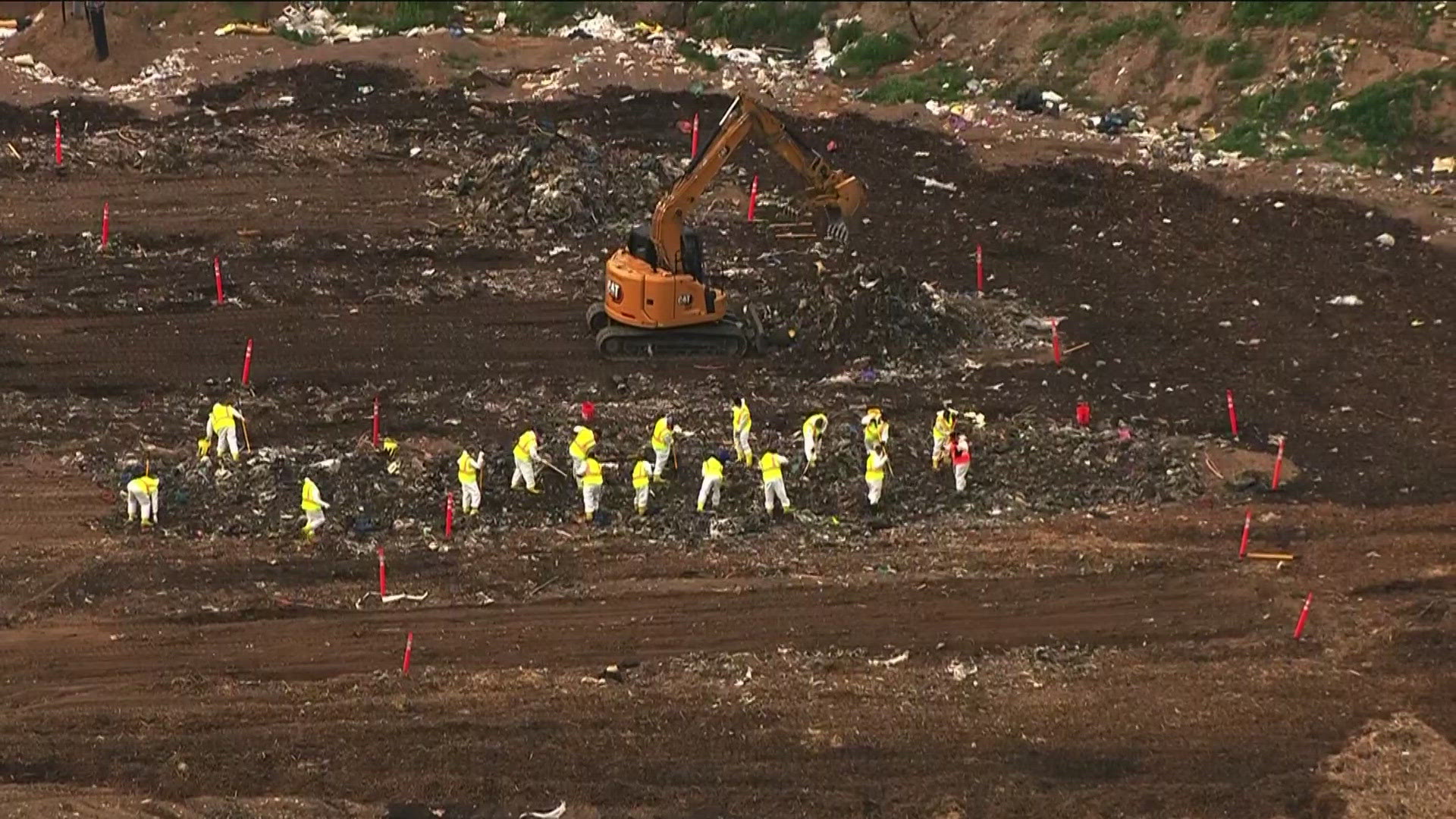 A massive search is underway in a landfill, which officials say is tied to the search for missing teenager Jordan "Manny" Collins.