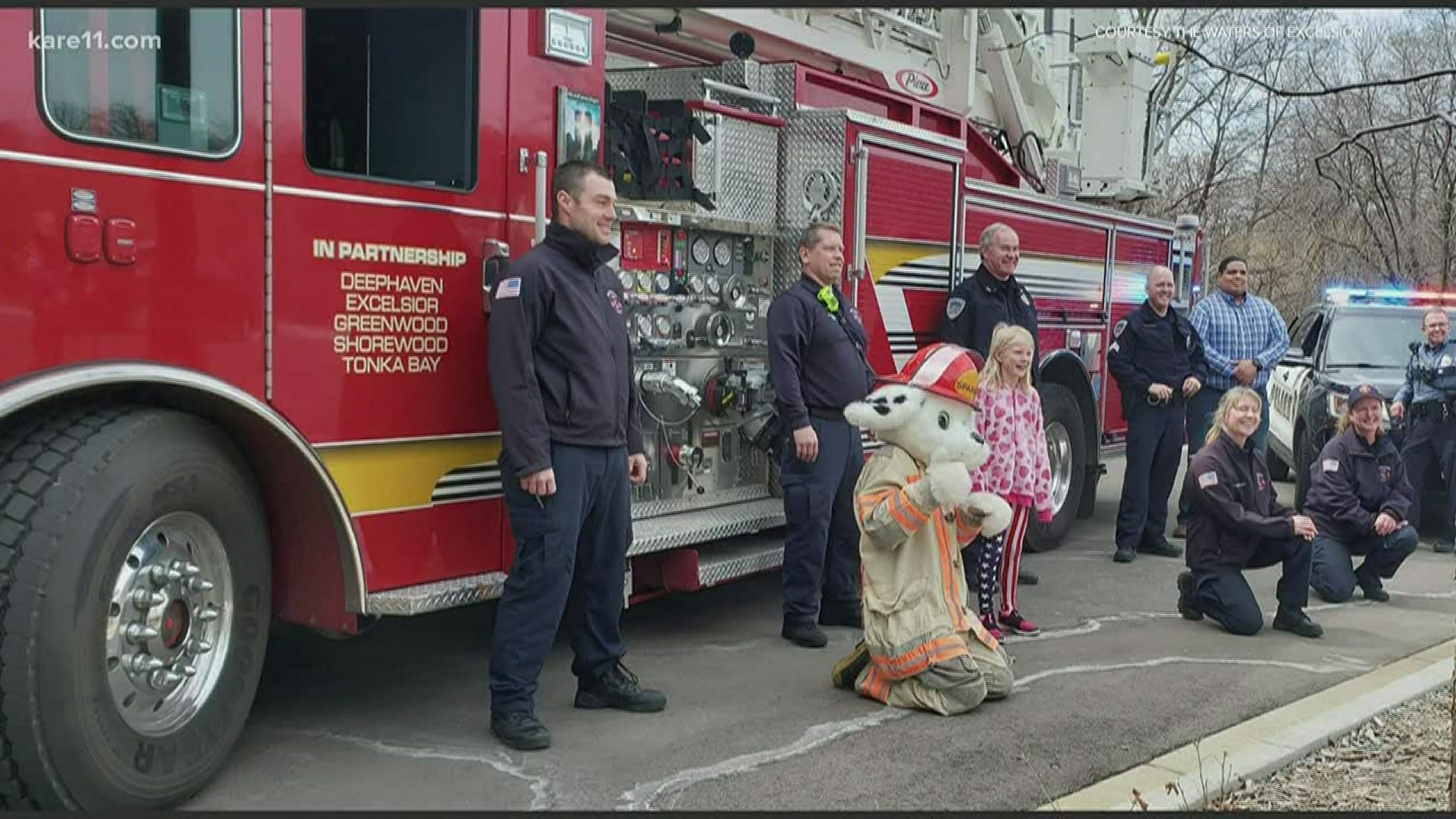 Excelsior police and firefighters went above and beyond the call of duty Monday, helping residents of a senior complex celebrate their birthdays.