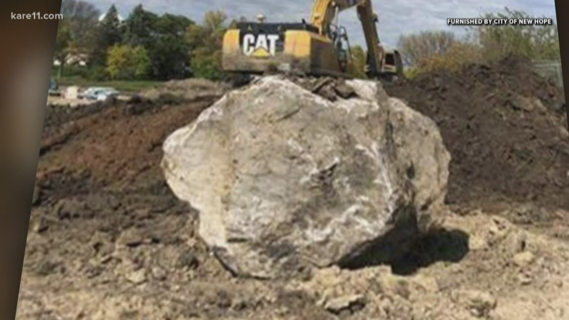 A boulder that weighs at least 100,000 lbs is getting in the way of a construction project in New Hope. City officials say they want to get rid of it.
