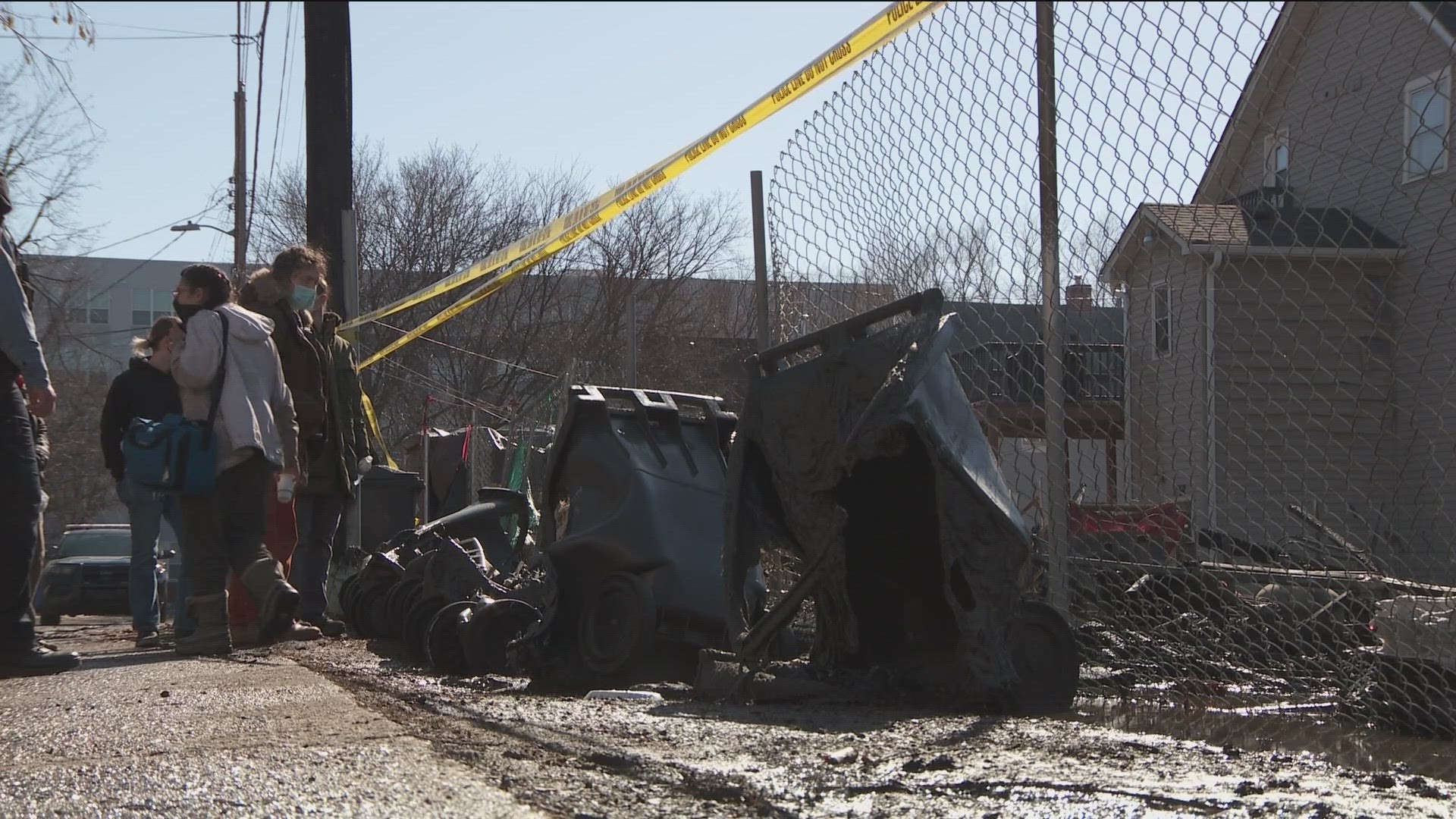 A witness says he saw small flames coming from a couple of structures on the 1100 block of E. 28th Street, and within seconds the whole encampment was ablaze.