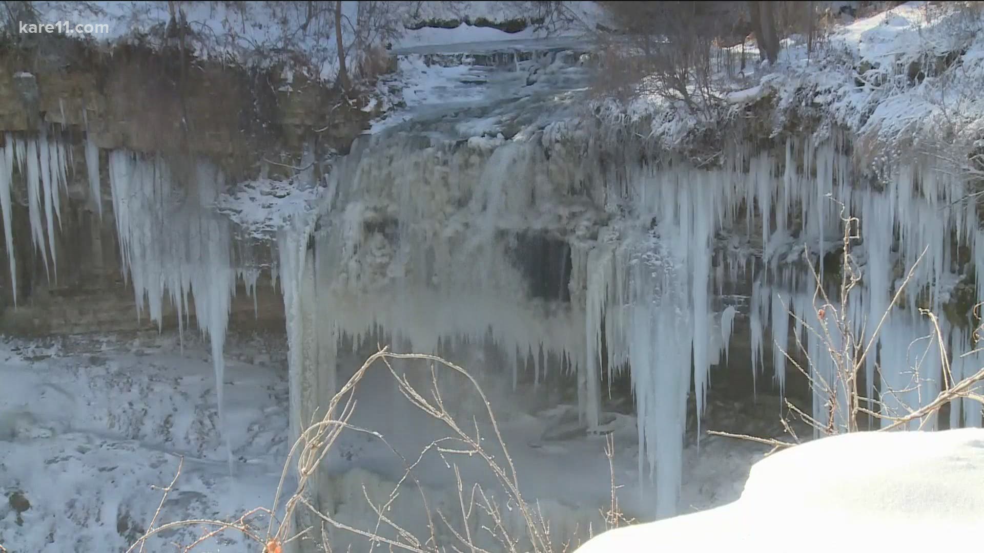 A few people brave the outdoors at Minnehaha Regional Park as temperatures dip into the single digits.