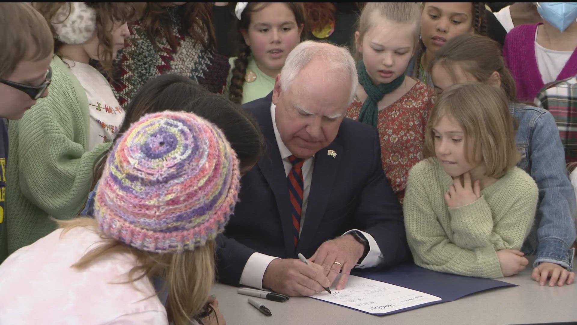 Governor Tim Walz visited Webster Elementary School in Minneapolis on March 17 to sign a bill that will provide Minnesota students with free breakfast and lunch.