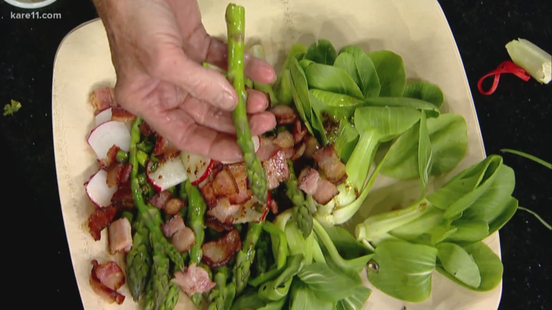 James Beard award winning cookbook author Beth Dooley serves us her take on a seasonal favorite: Asparagus & radish salad in bacon vinaigrette.