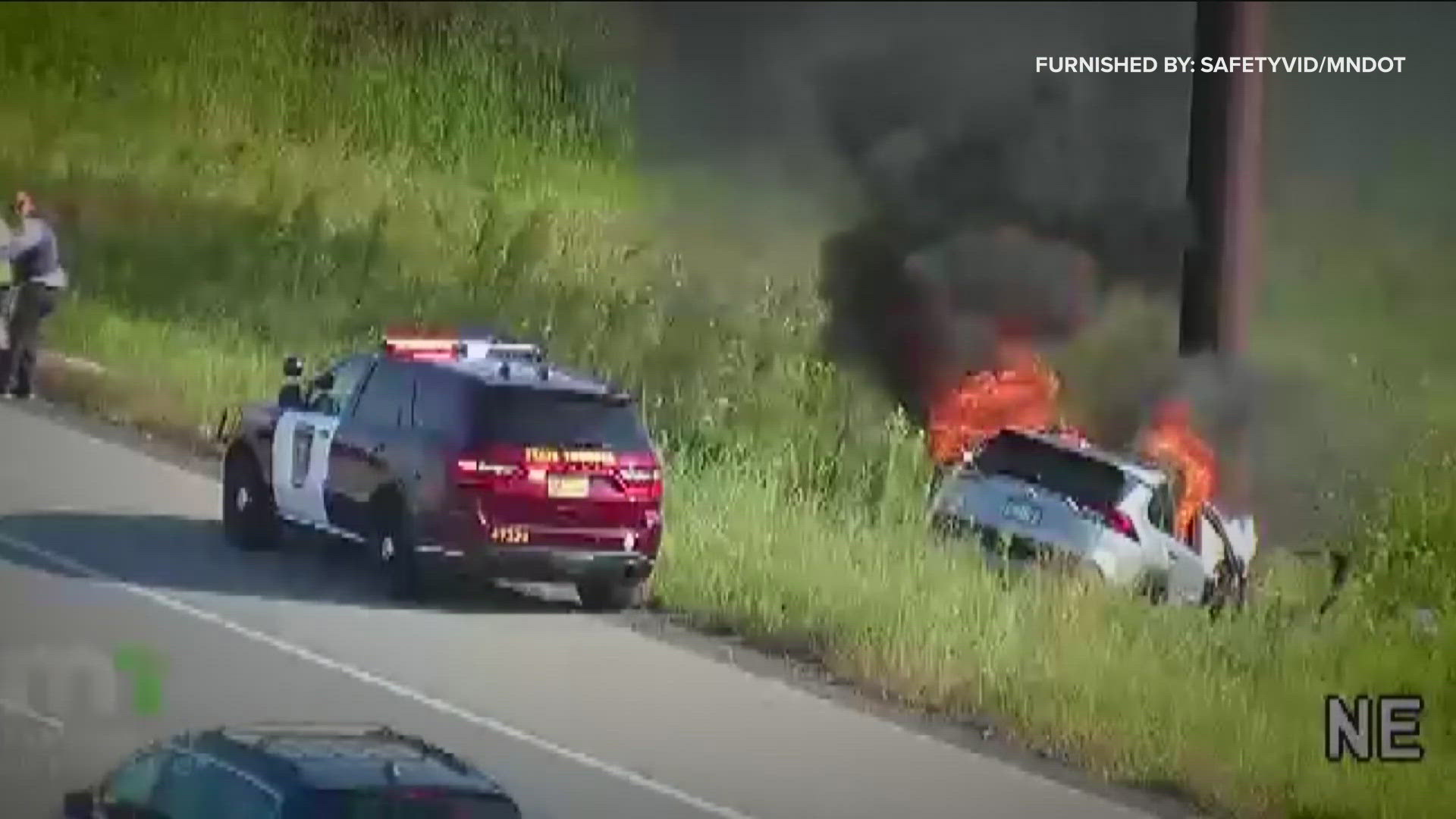 The Minnesota State Patrol says the driver left the road and struck a light pole off I-35W in Roseville, causing the compact SUV to catch fire.