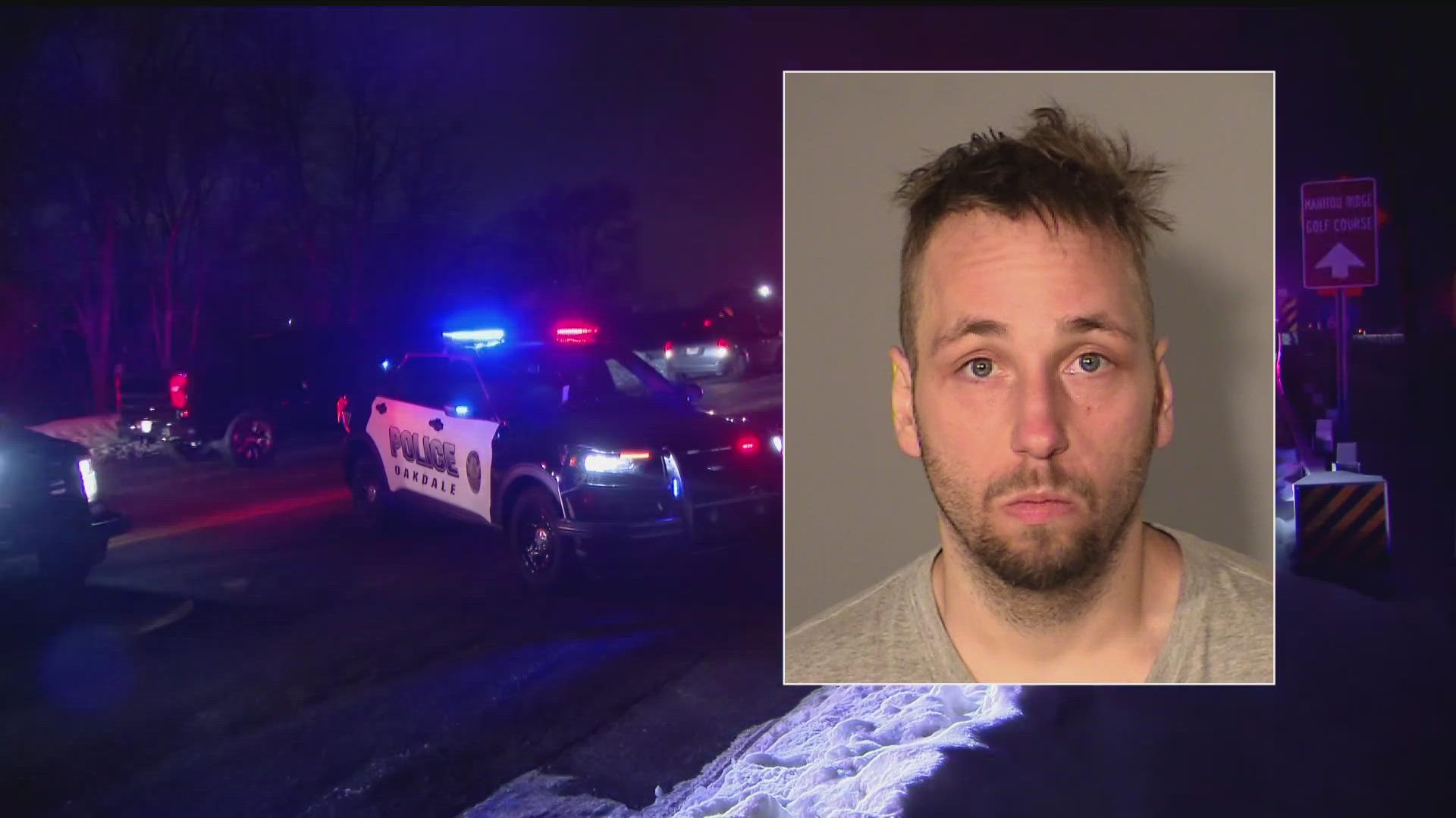 According to the criminal complaint, Daniel Loren Holmgren, Jr. fired "multiple times" at officers, striking one of them in the leg, stomach and pelvis.