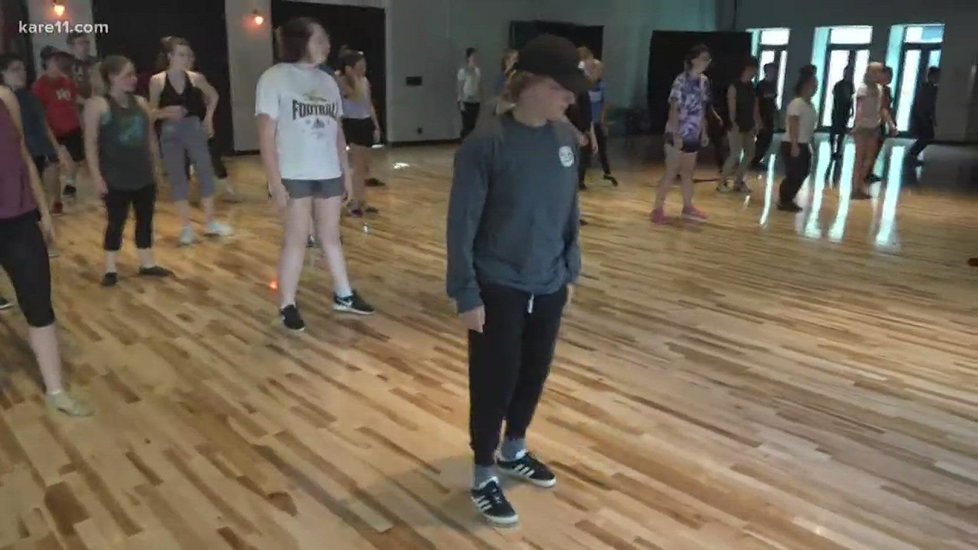 Local high school students learn from Hamilton cast