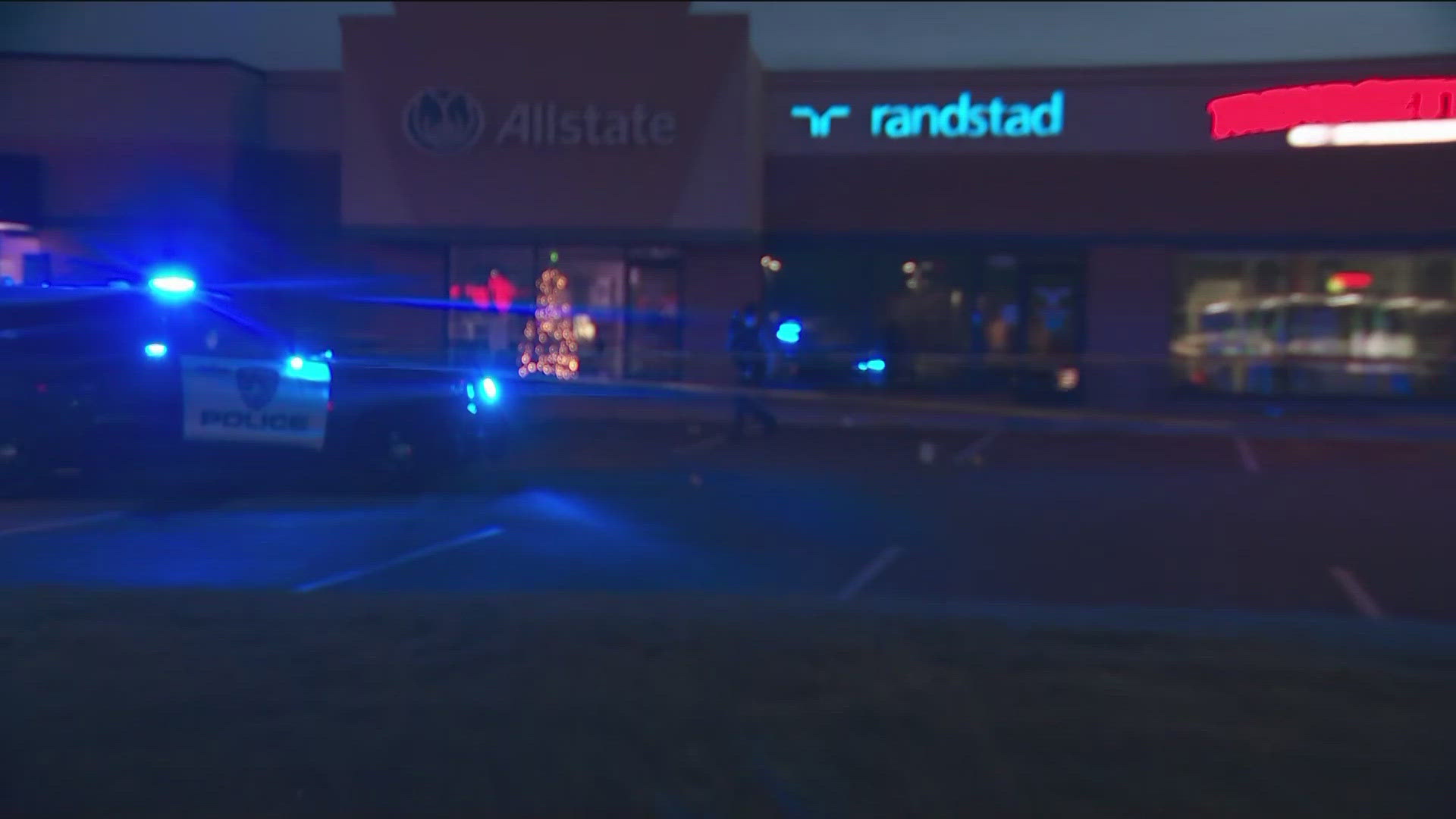 Shots were reportedly fired near a strip mall in the city.