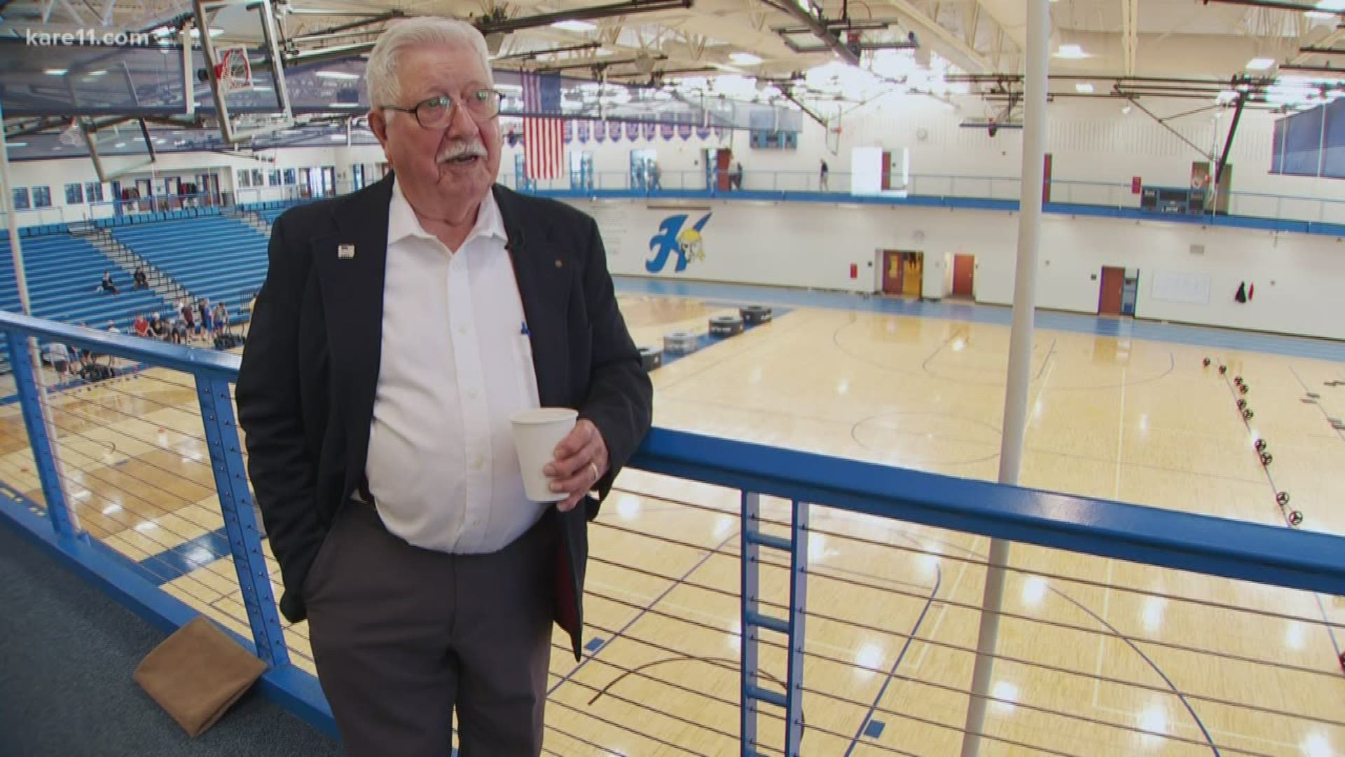 Air Force veteran Loren Mollet strikes up friendship while walking the track in the Hastings High School gym.