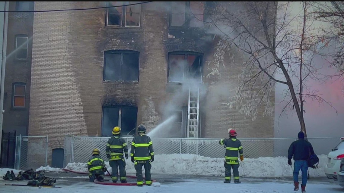 Minneapolis fire crews respond to fire at boarded up apartment building