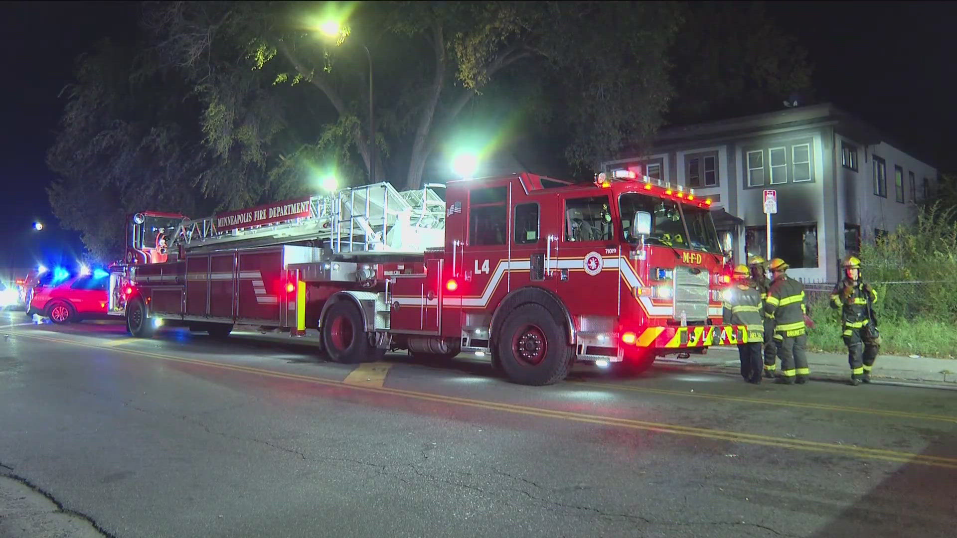 Minneapolis fire officials rescued four people from a fire in the Cleveland neighborhood on Friday morning. It's not clear if the fire and shooting are related.