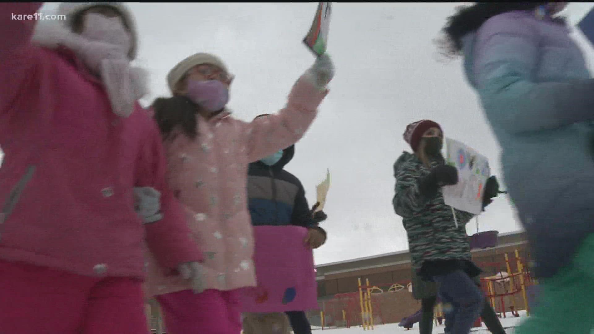 Students made laps around Sheridan School, holding signs and chanting messages to voice their concerns.