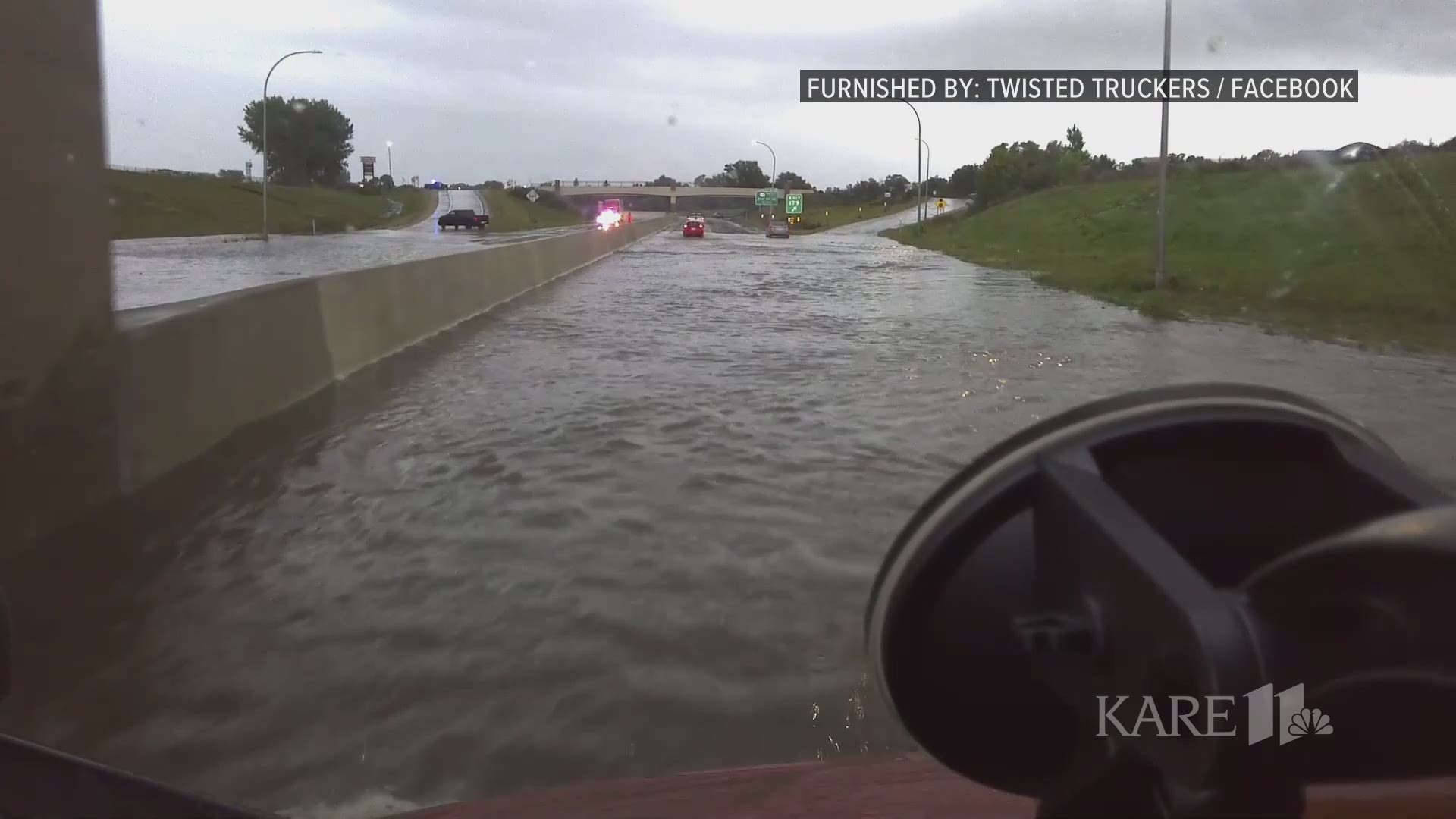 Video recorded prior to the full closure showed the depth of the flooding on the freeway.
