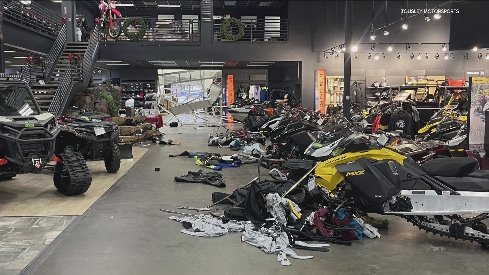 Surveillance video shows him crashing a Polaris Ranger into expensive merchandise and bursting through garage doors.