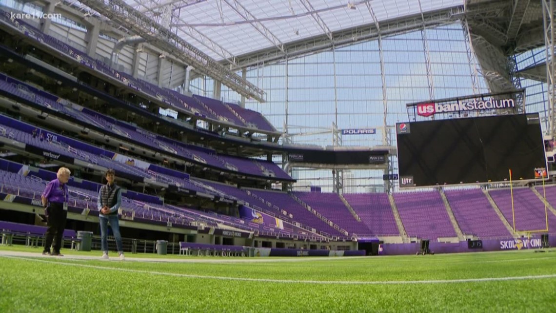 Cutouts of Minnesota Vikings fans are shown in the stands of US