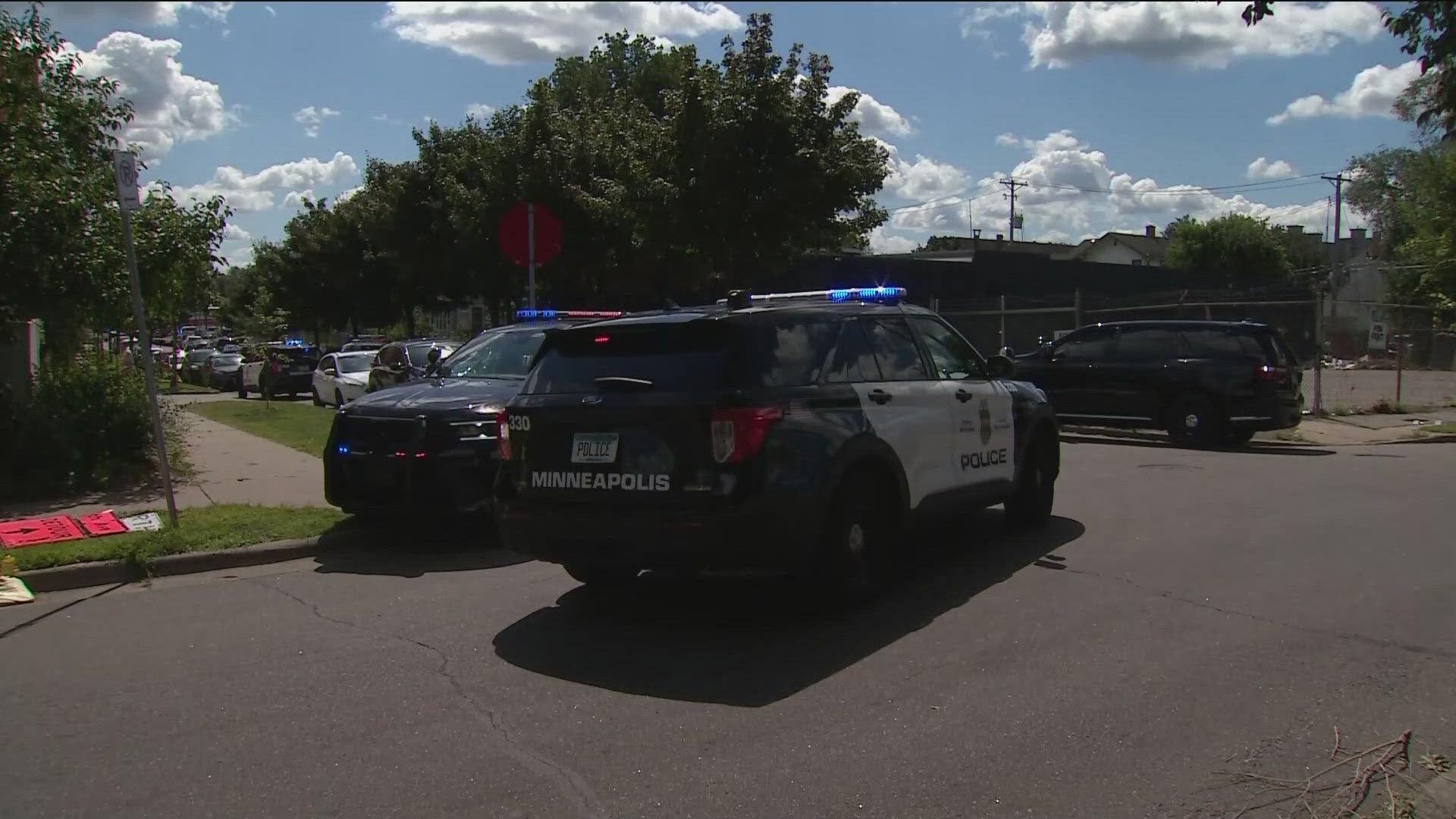 Authorities charge Ryan Quinn and Tiffany Martindale as accomplices in a deadly Minneapolis shooting, as the gunman remains at large. 