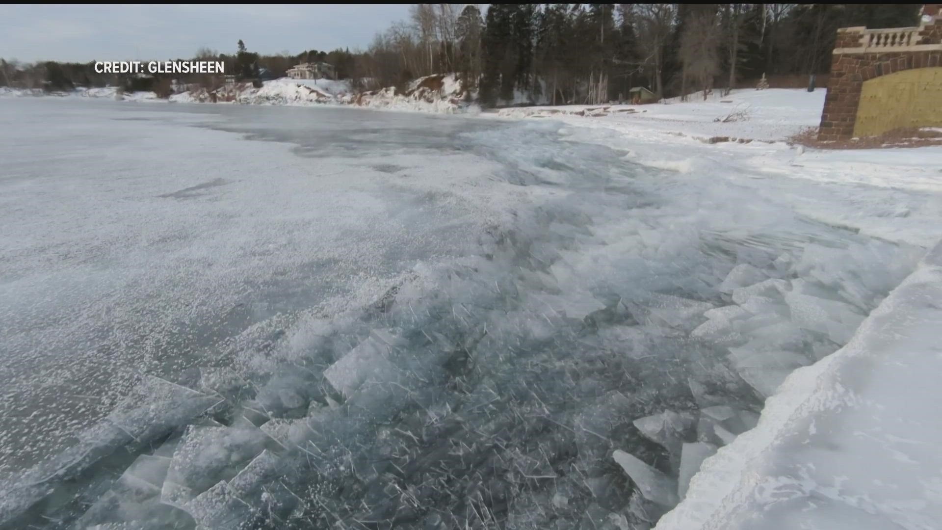 Lake Superior pushes a thin layer of ice onto the shoreline by Glensheen Mansion in Duluth.