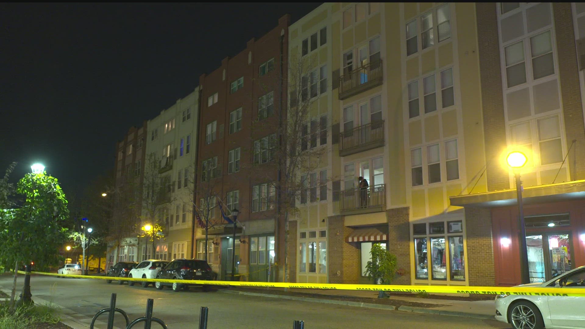 A high volume of water was seen pouring from a 4th-floor apartment at Uptown Lake Apartments after a volley of bullets, causing significant damage to units below.