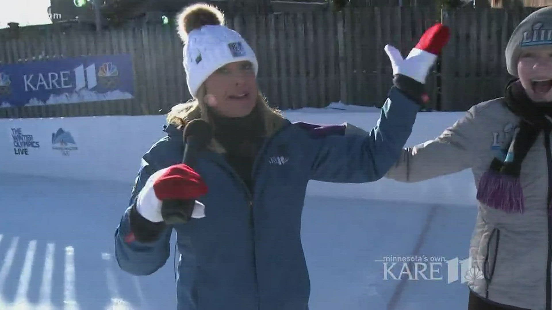 Karla Hult is joined by synchronized figure skaters in Kare 11's front yard at the UCare Ice Rink.