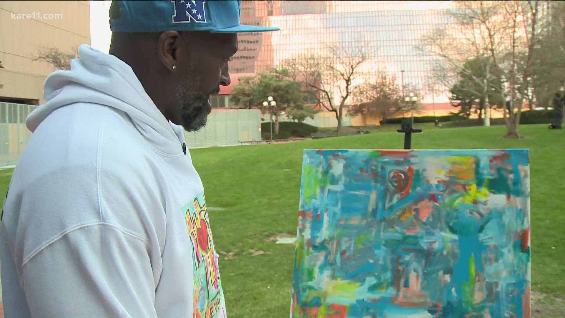 Black artist, Sean Garrison, painted a piece of art outside the courthouse during Tuesday's Derek Chauvin verdict