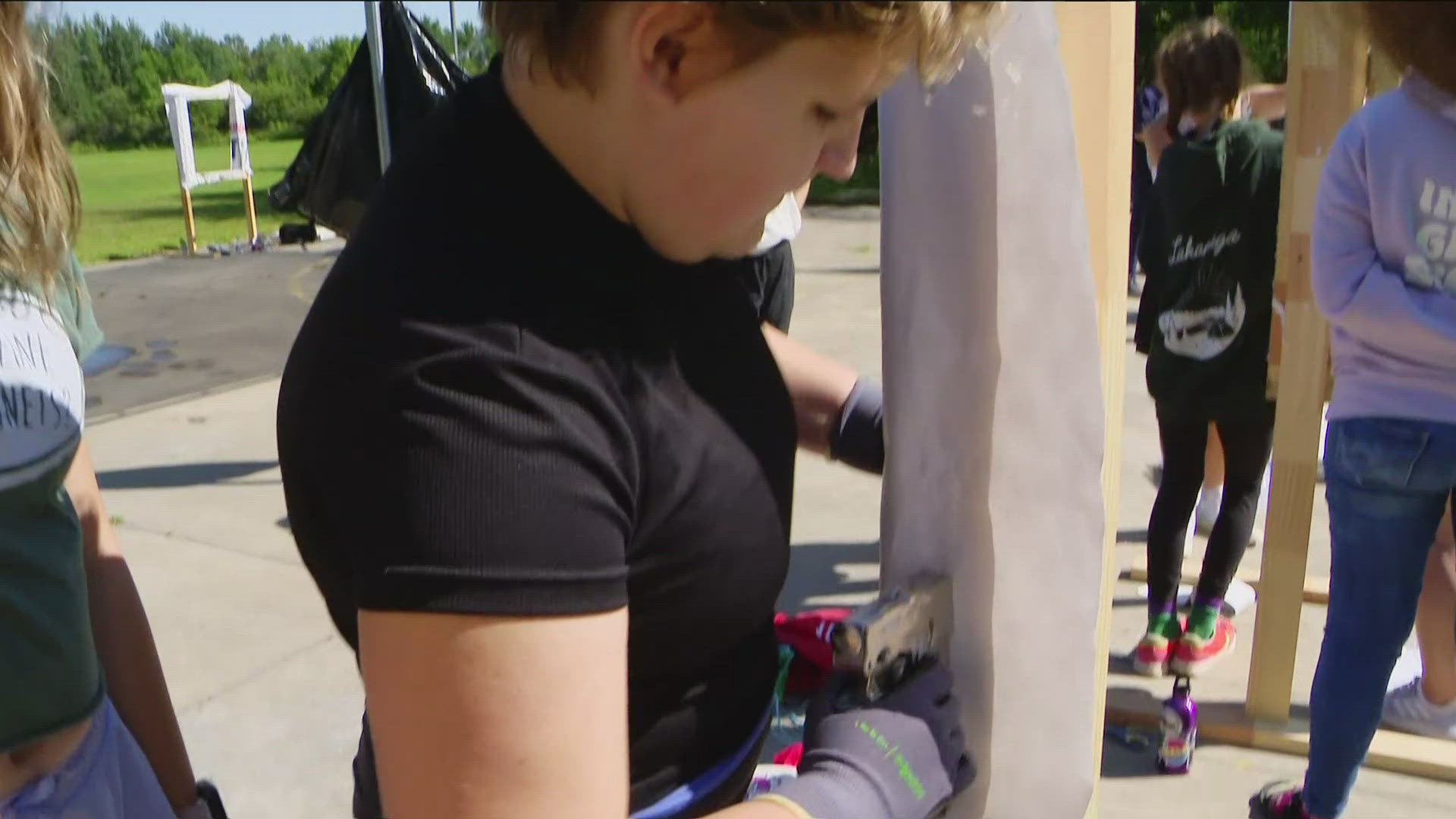 The girls are getting a hands-on learning experience in carpentry, electrical wiring, sustainable design and more.