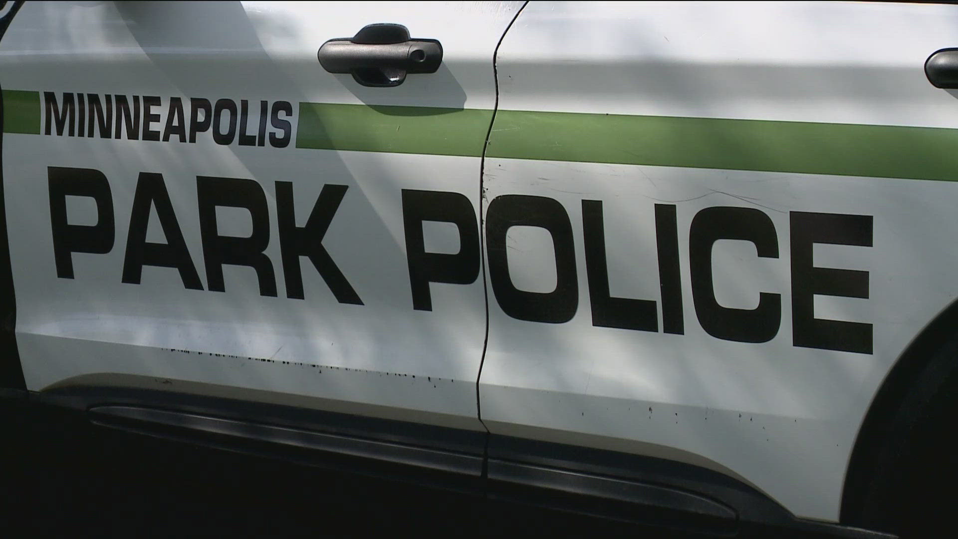 Police believe the officer's weapon fired while still holstered during a struggle with a suspect.