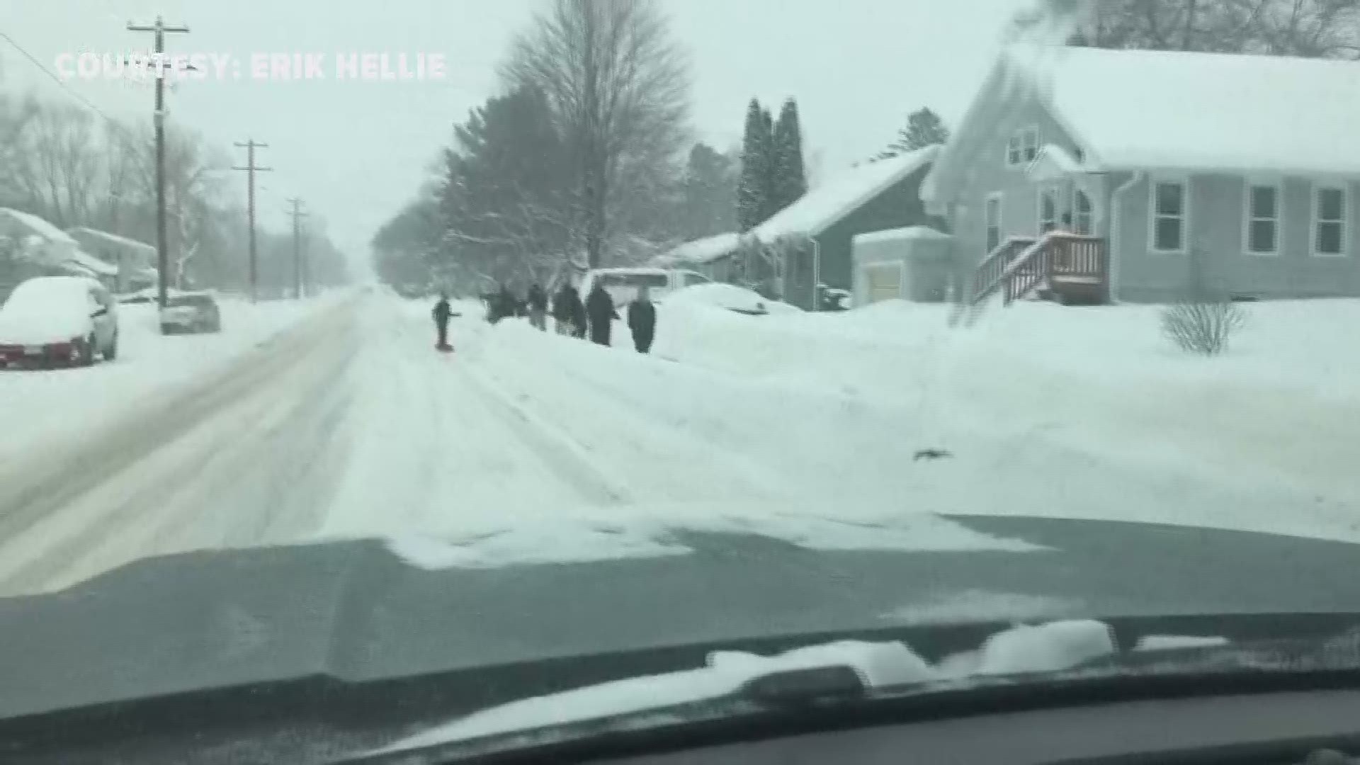 About a dozen 7th and 8th grade hockey players rallied, along with some siblings, and spent the day shoveling out neighbors and businesses in Amery, Wisconsin. https://kare11.tv/2ImDl0v