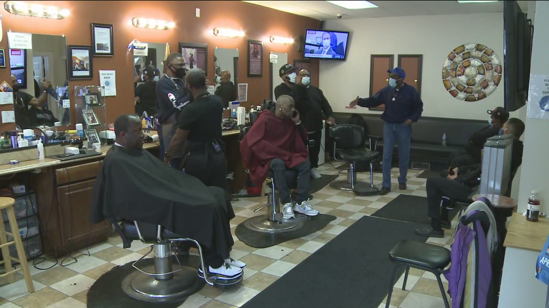 A barbershop full of customers and family in south Minneapolis experienced a moment in time they will remember for years to come