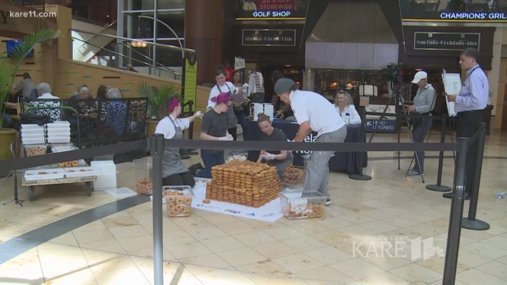 A group of bakers from Angel Food Bakery & Donut Bar attempted to break a Guinness World Record for the tallest donut stack. They made their attempt at MSP. http://kare11.tv/2ywM2yG